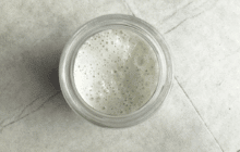 A photo showing what deflated sourdough starter looks like